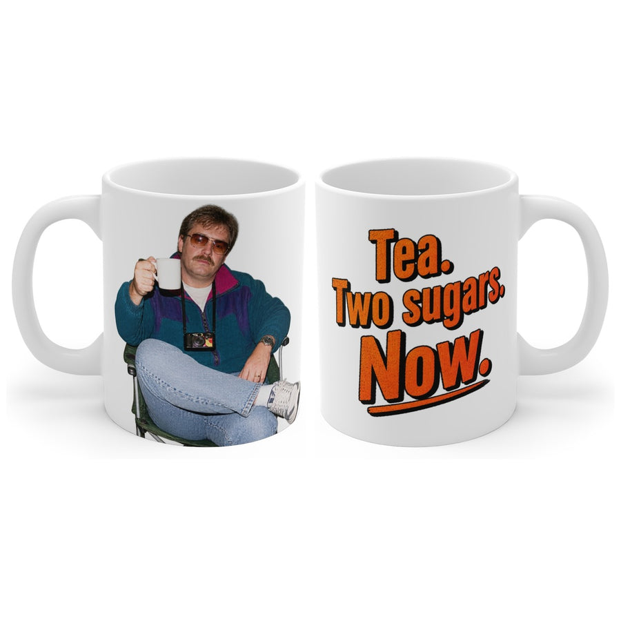 Tea. Two sugars. Now. mug, handle right