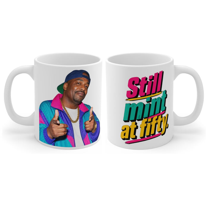 Still mint at fifty. mug, handle right