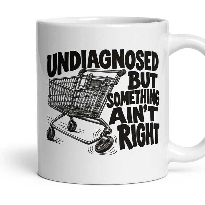 UNDIAGNOSED BUT SOMETHING AIN'T RIGHT mug, 11oz white ceramic, handle right