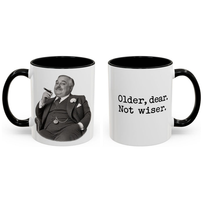 Older, dear. Not wiser. mug, 11oz white ceramic, black handle and interior, handle right
