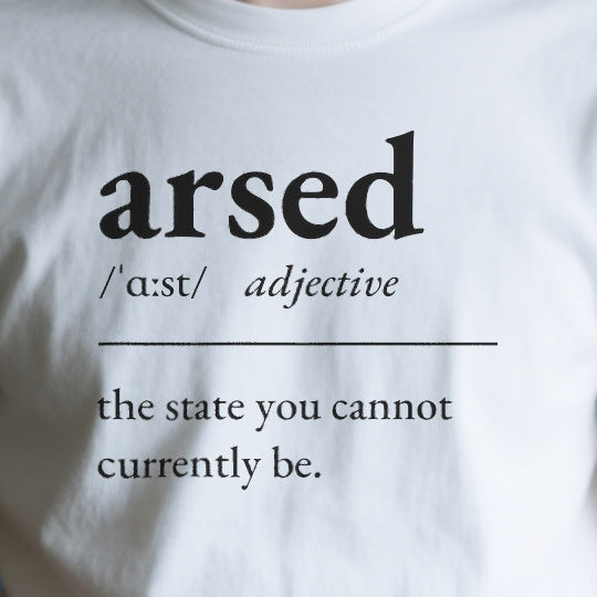 Close-up of the ODE7C83F7B9F print on a white unisex t-shirt