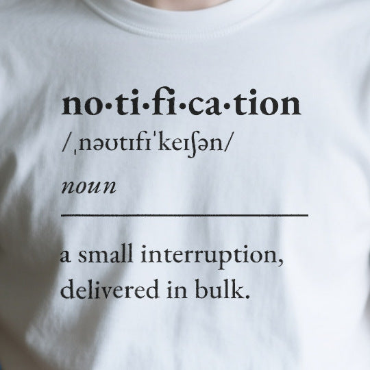 Close-up of the OD50A96797EC print on a white unisex t-shirt