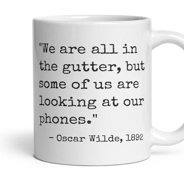 We are all in the gutter, but some of us are looking at our phones. mug, 11oz white ceramic, handle right