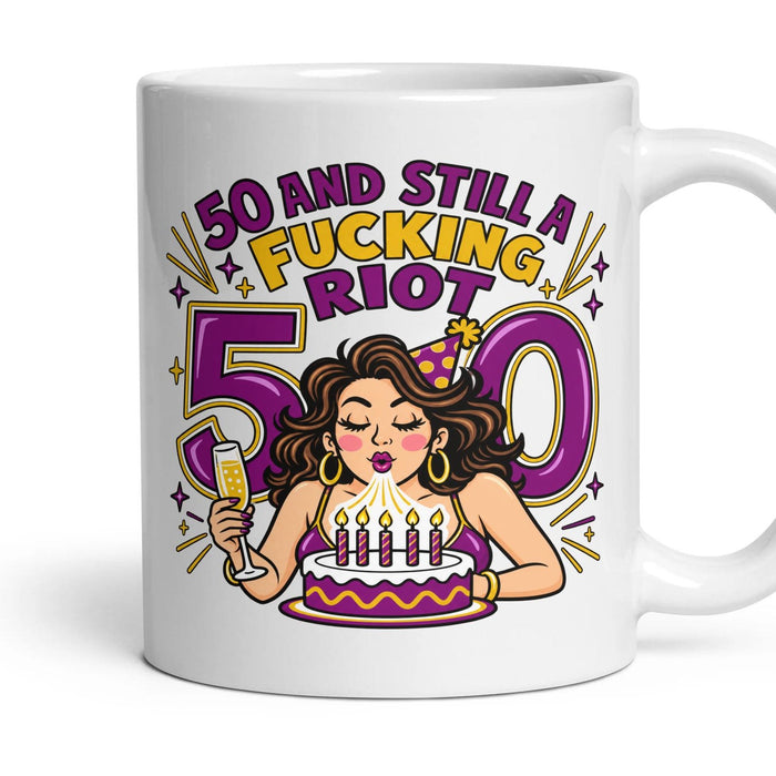 50 AND STILL A FUCKING RIOT mug, 11oz white ceramic, handle right